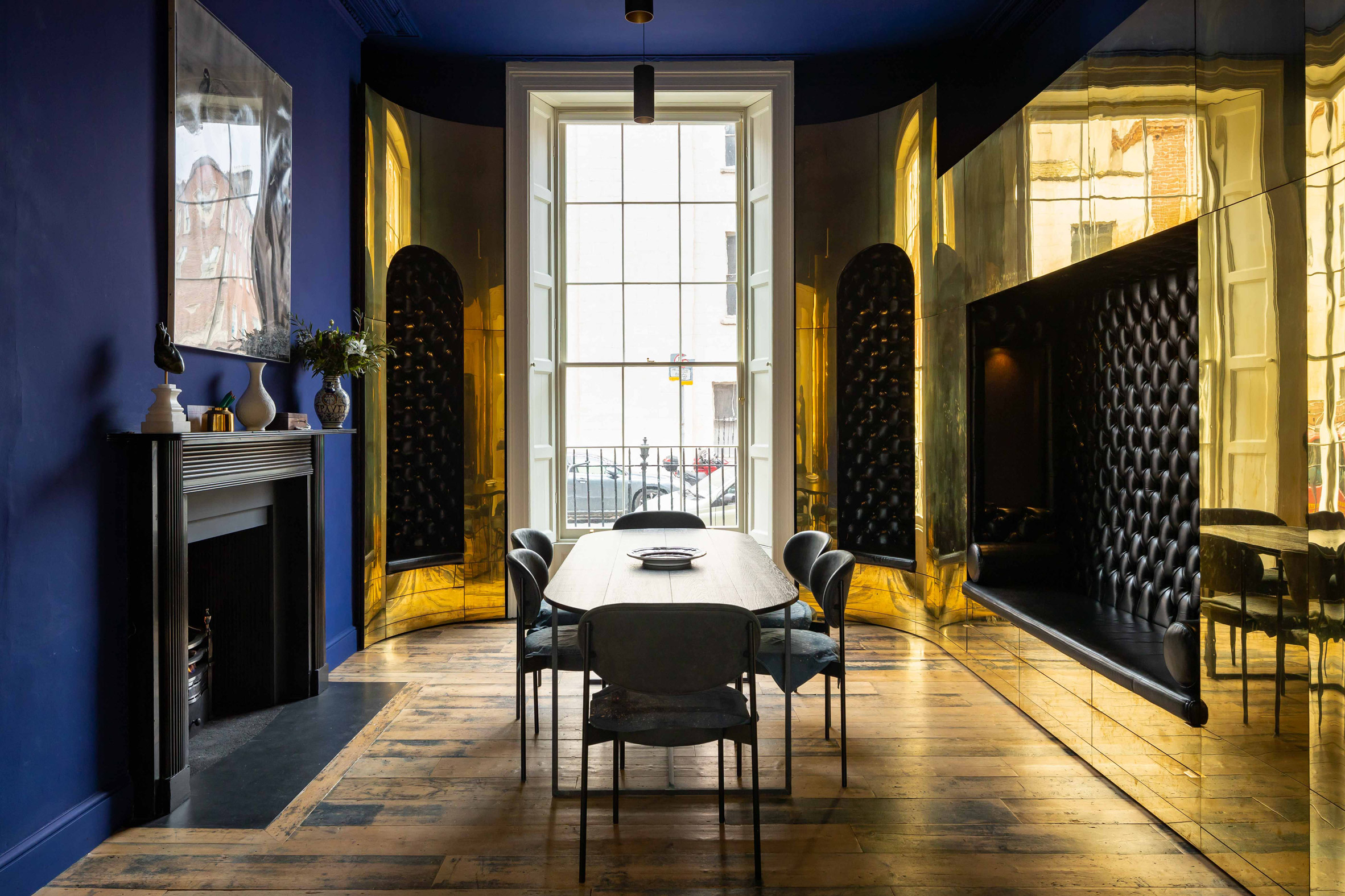 Dining room with golden panelling