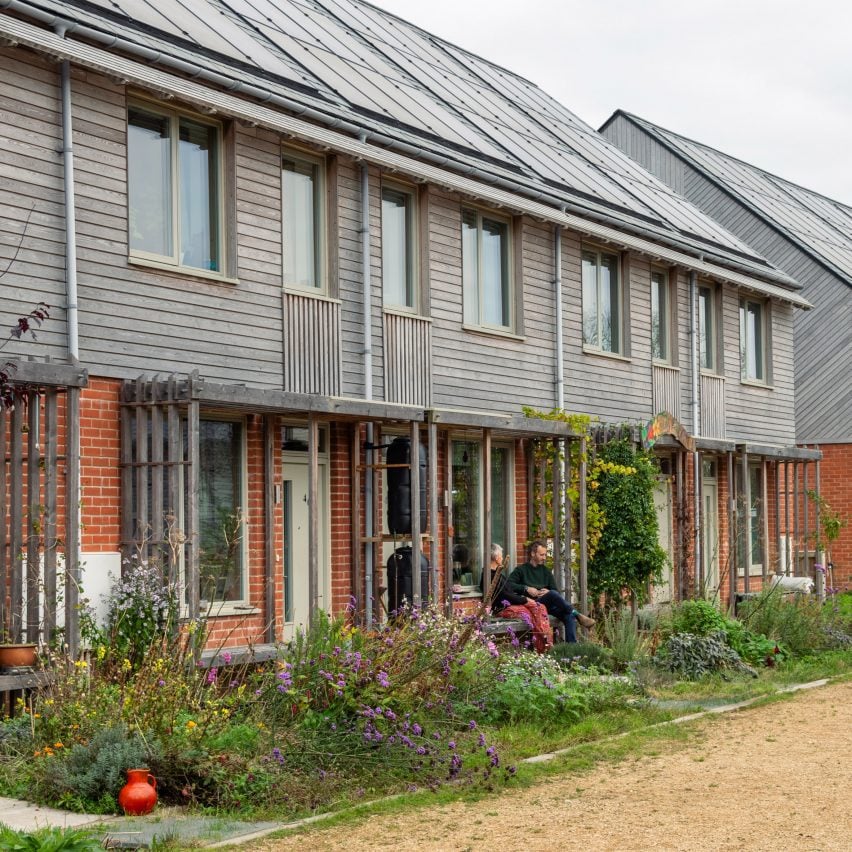 People gathered outside Hazelmead co-housing development Devon