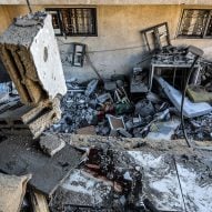 Destroyed buildings in Gaza. Photo via Shutterstock