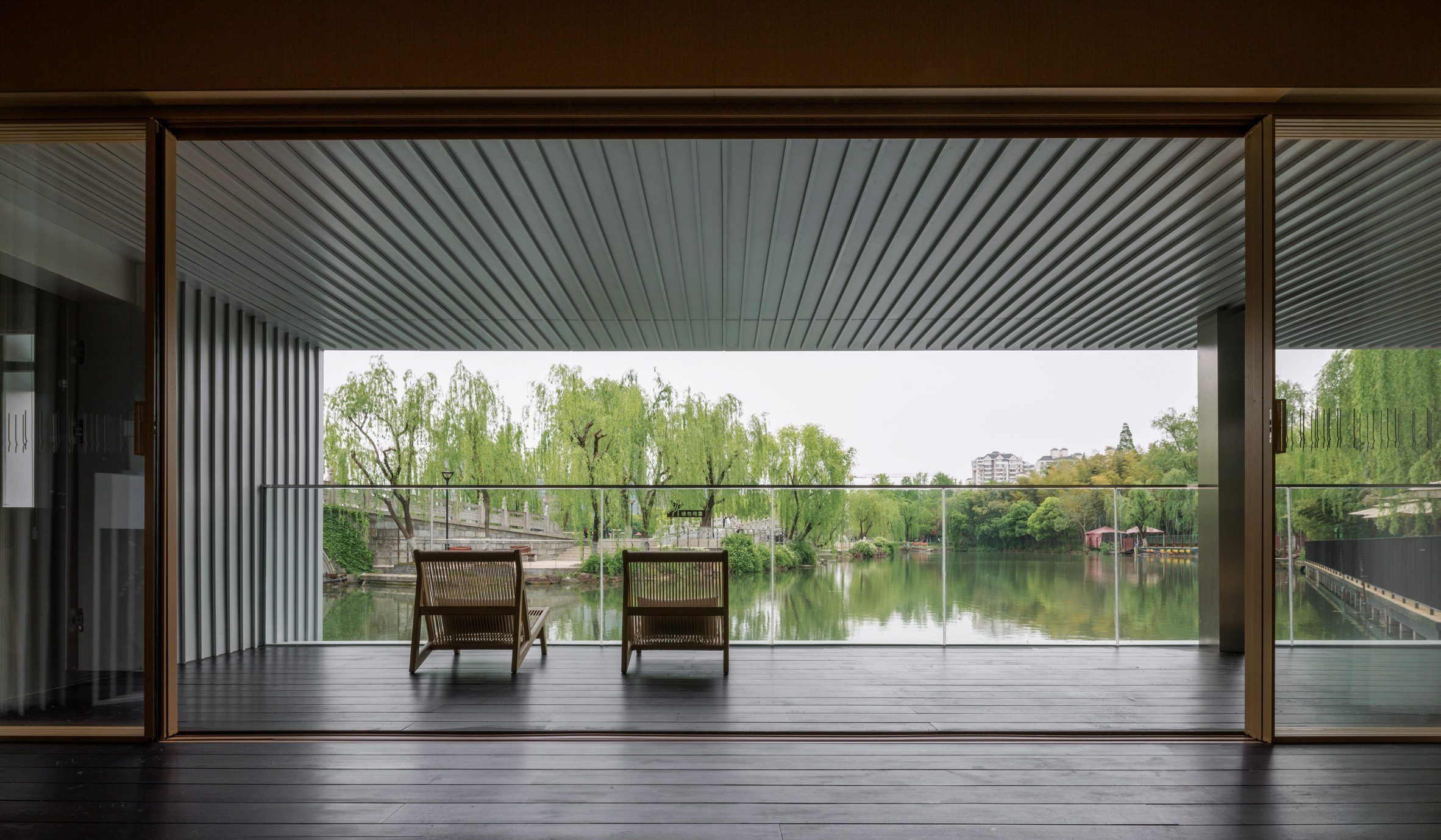 View towards lake from within Shanghai pavilion by Wutopia Lab
