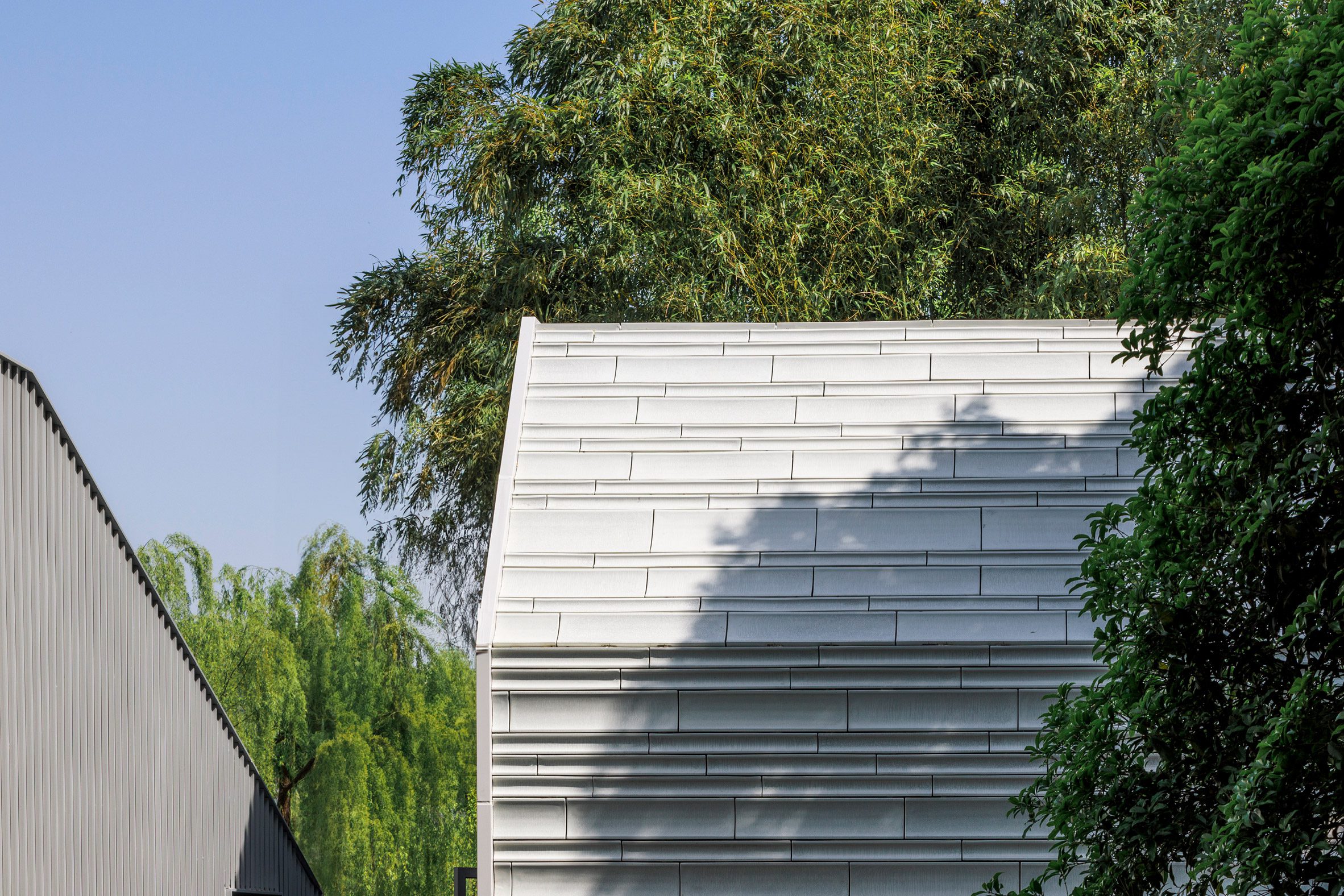 Close-up of tiled structure by Wutopia Lab