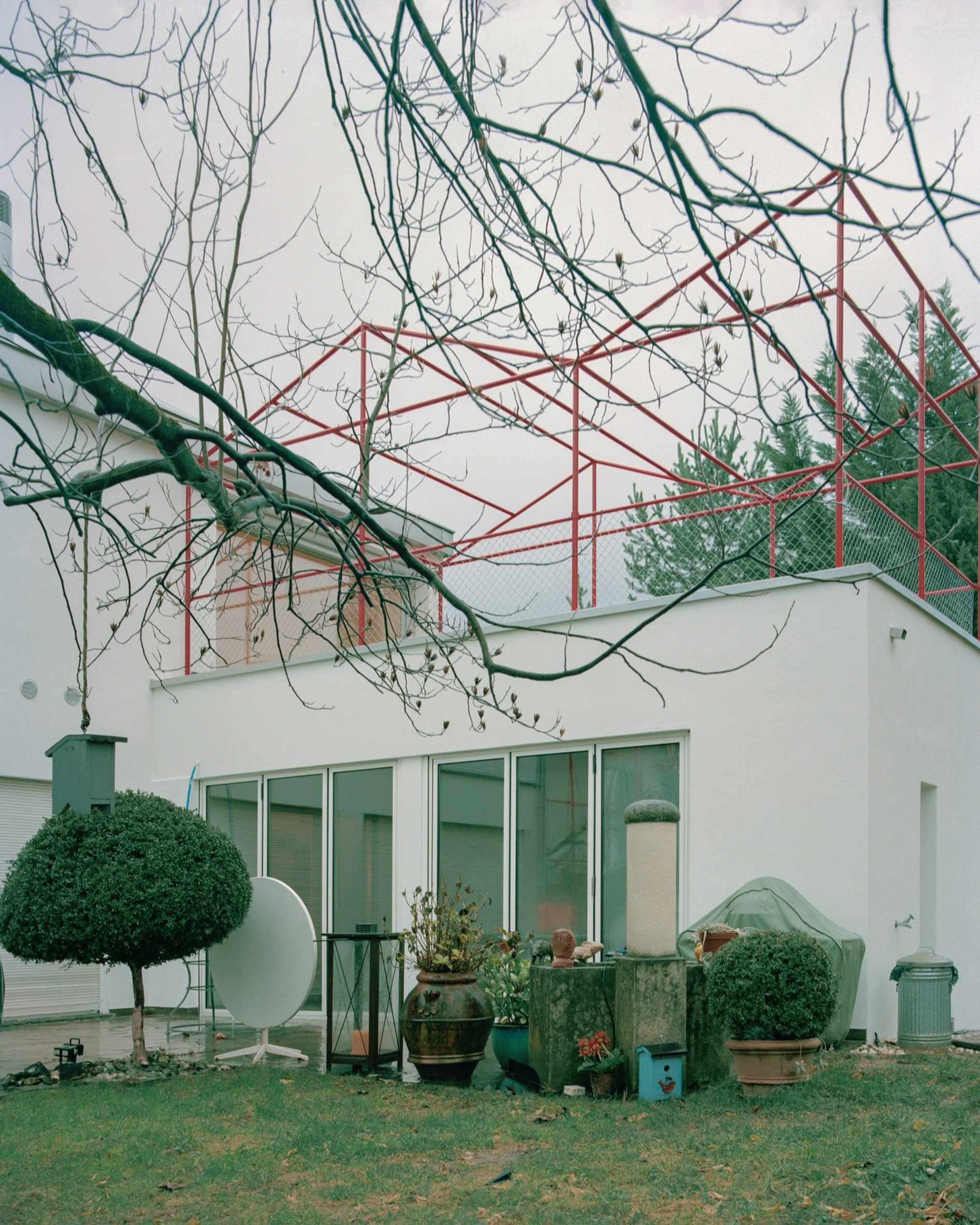 Geometric red steel pergola 