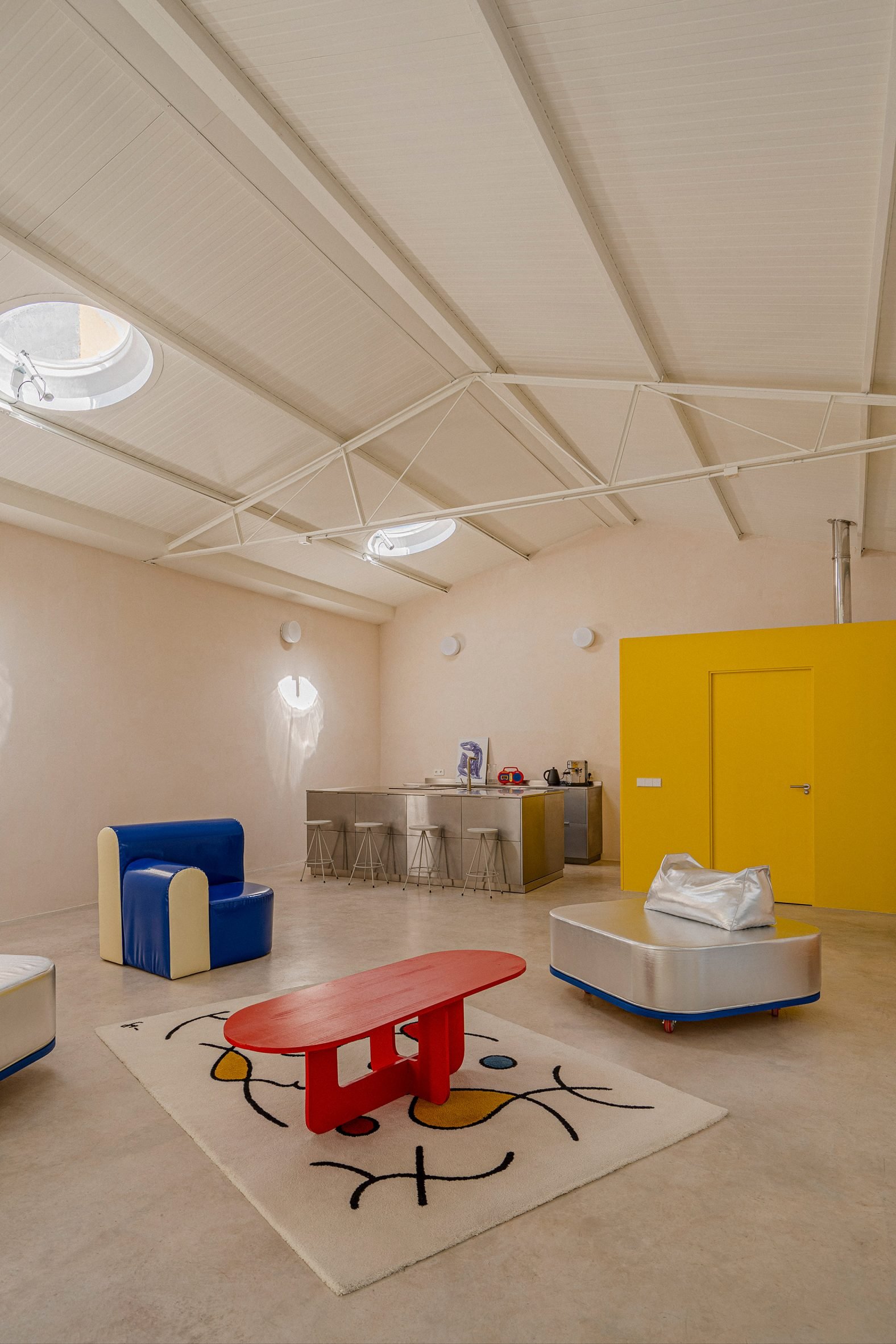 Colourful interior of public venue by Burr Studio