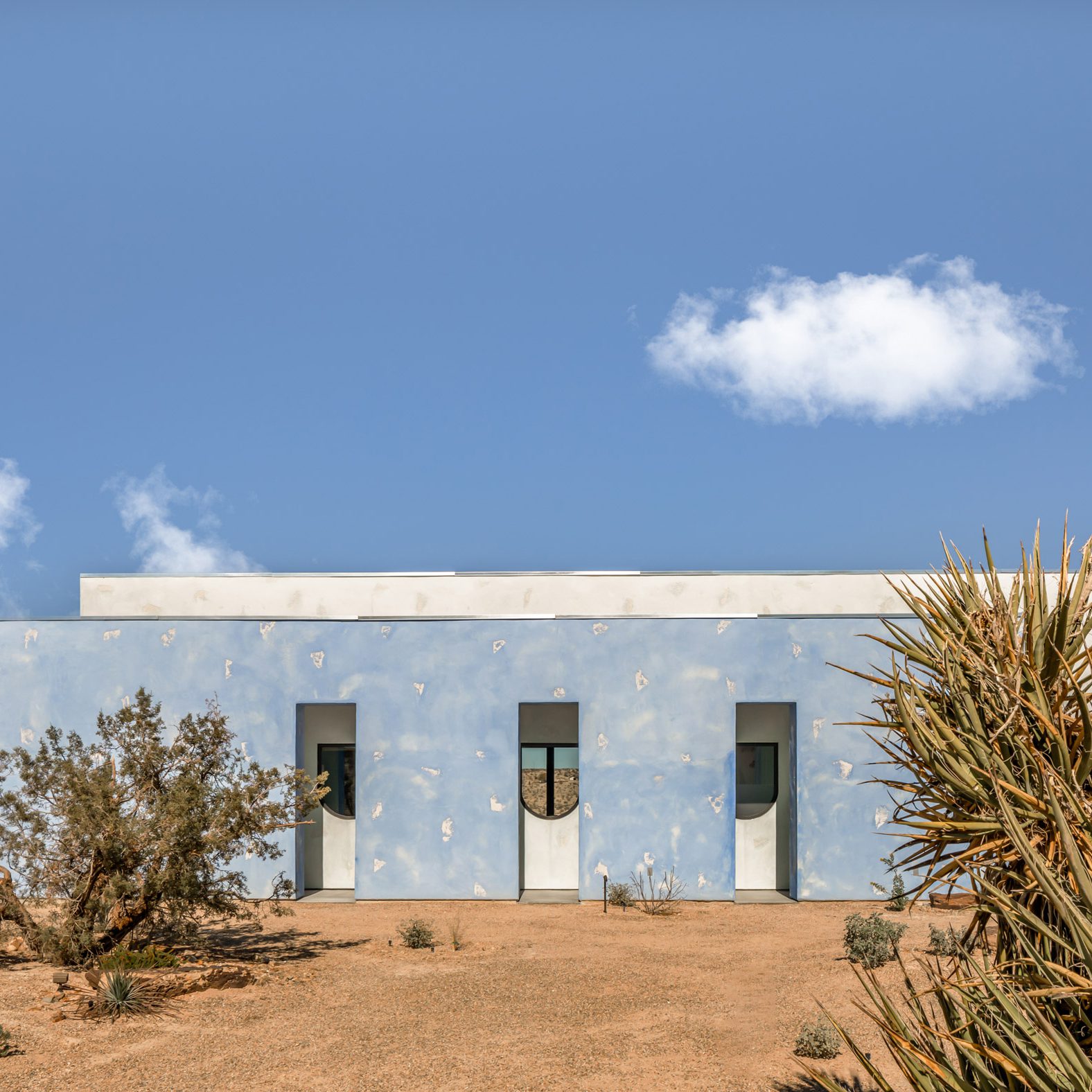 Blue house in California desert