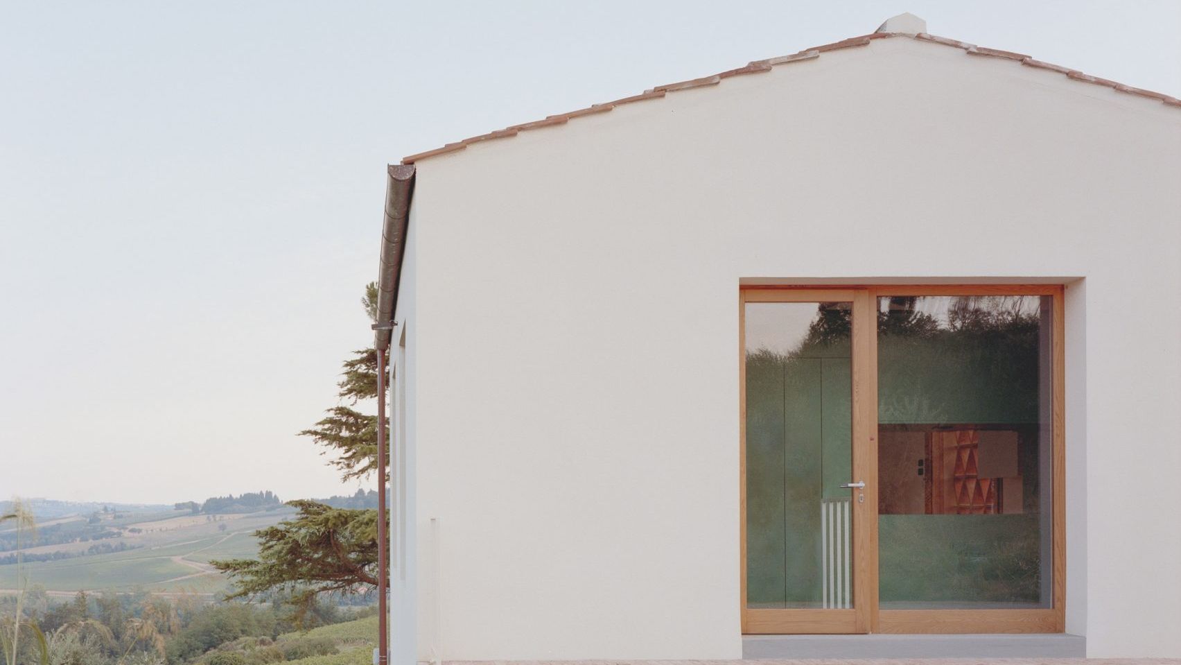 Barn conversion with rendered white walls