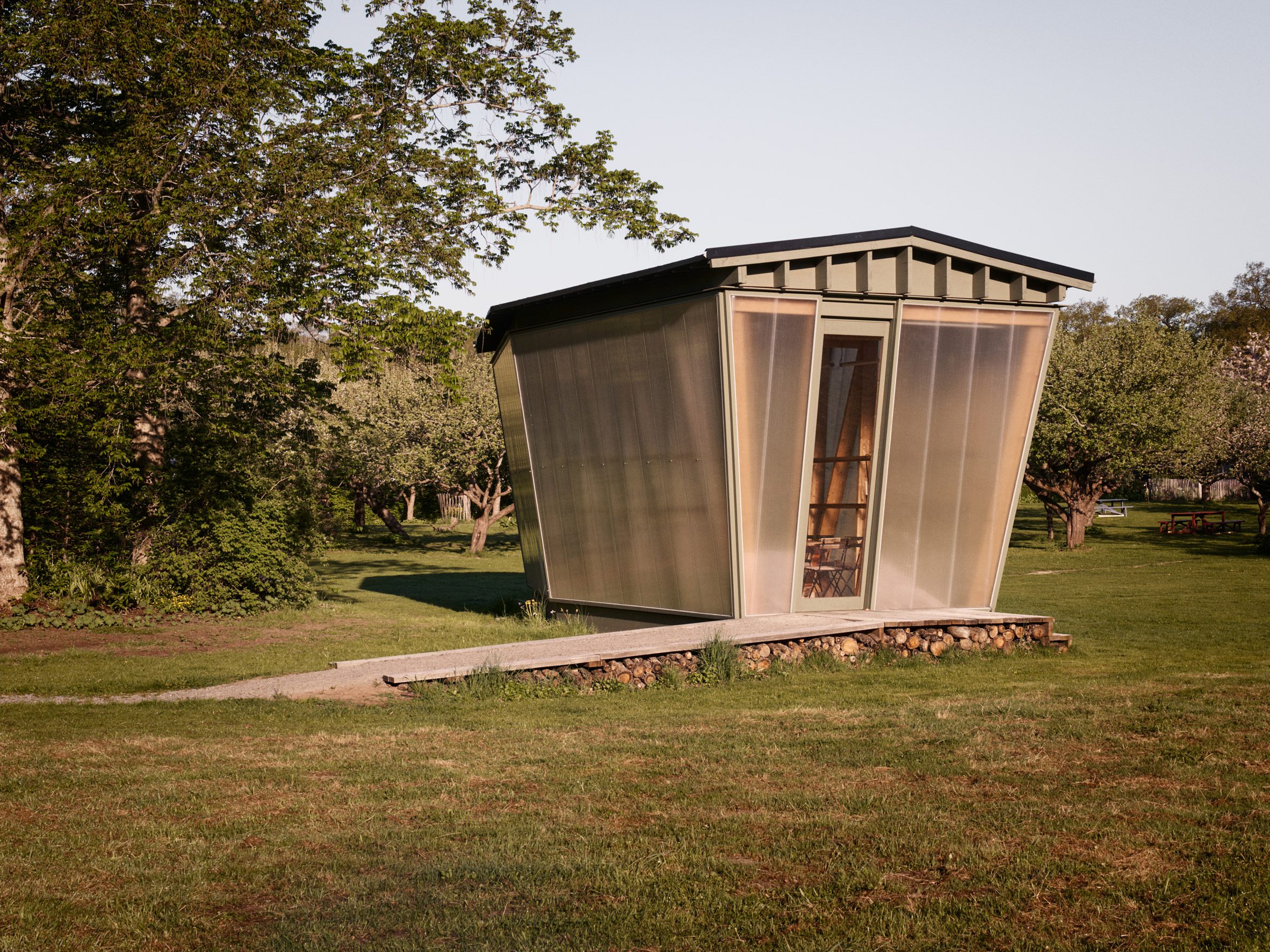 Wooden pavilion with polycarbonate walls