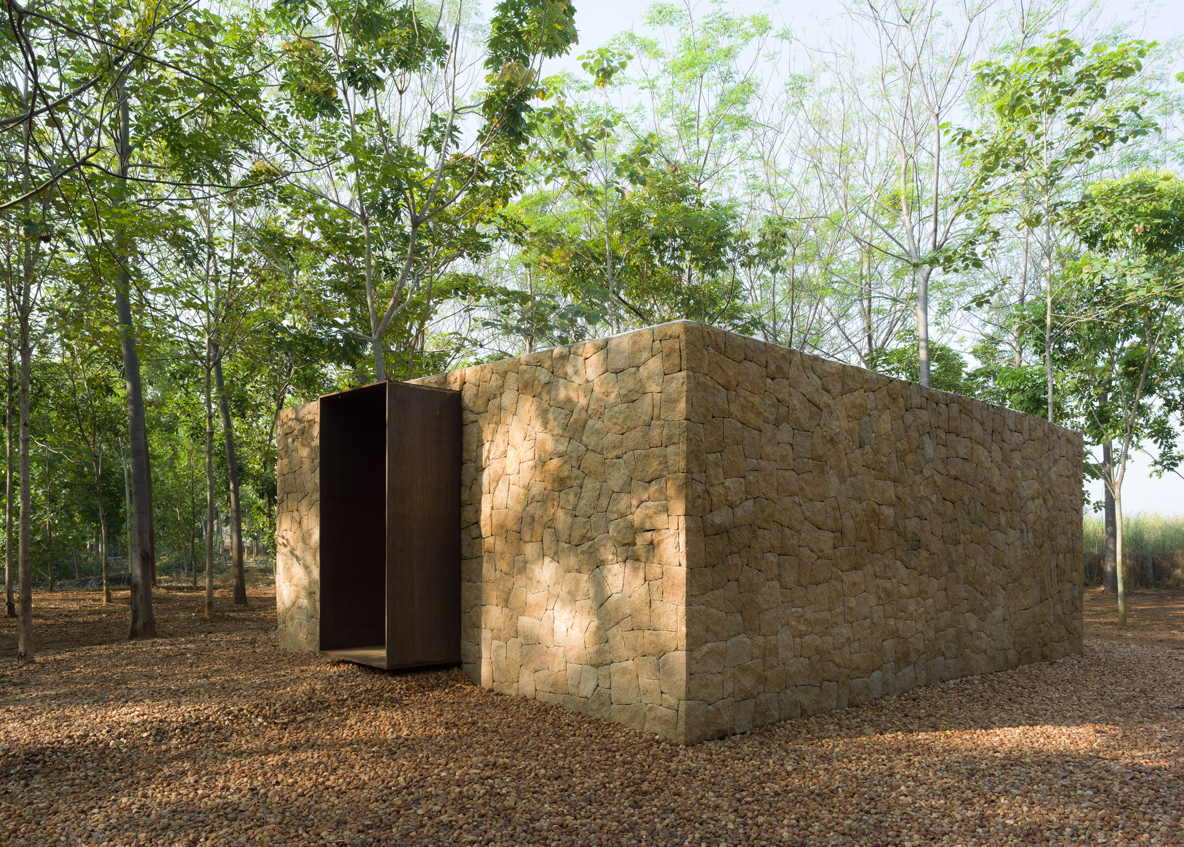 View towards entrance of stone memorial by 182 Design