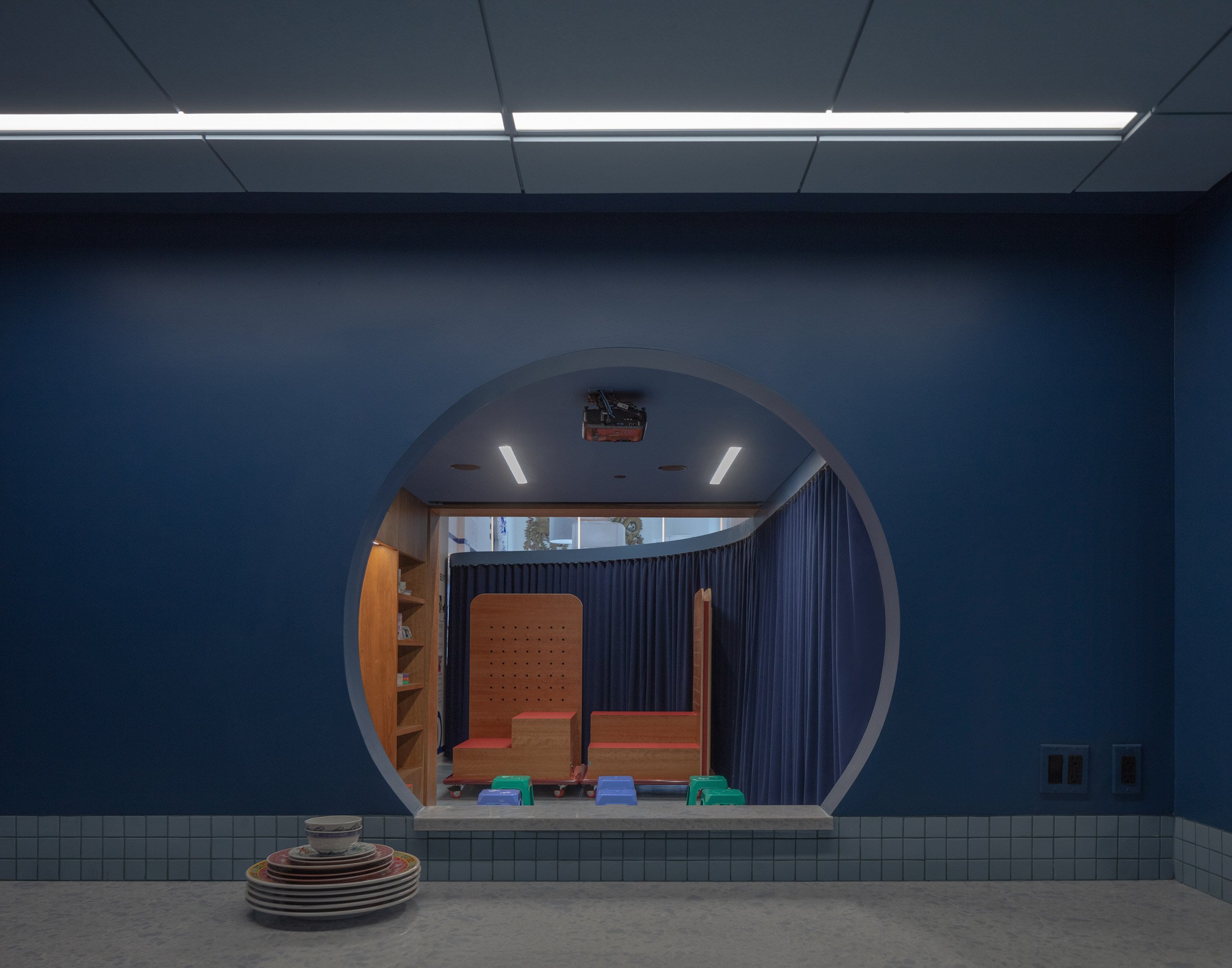 Wooden seating in Small Business Innovation Hub by TK Justin Ng