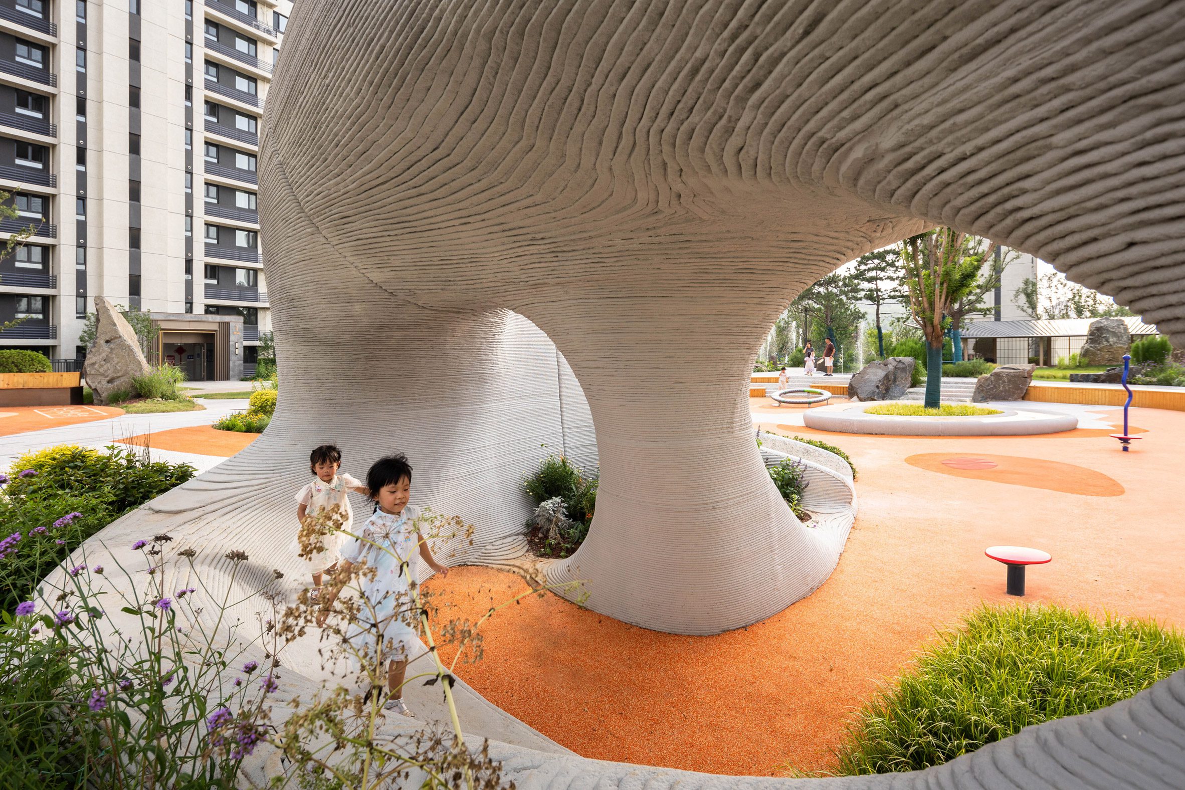 Children playing at 3D-printed playground by XISUI Design