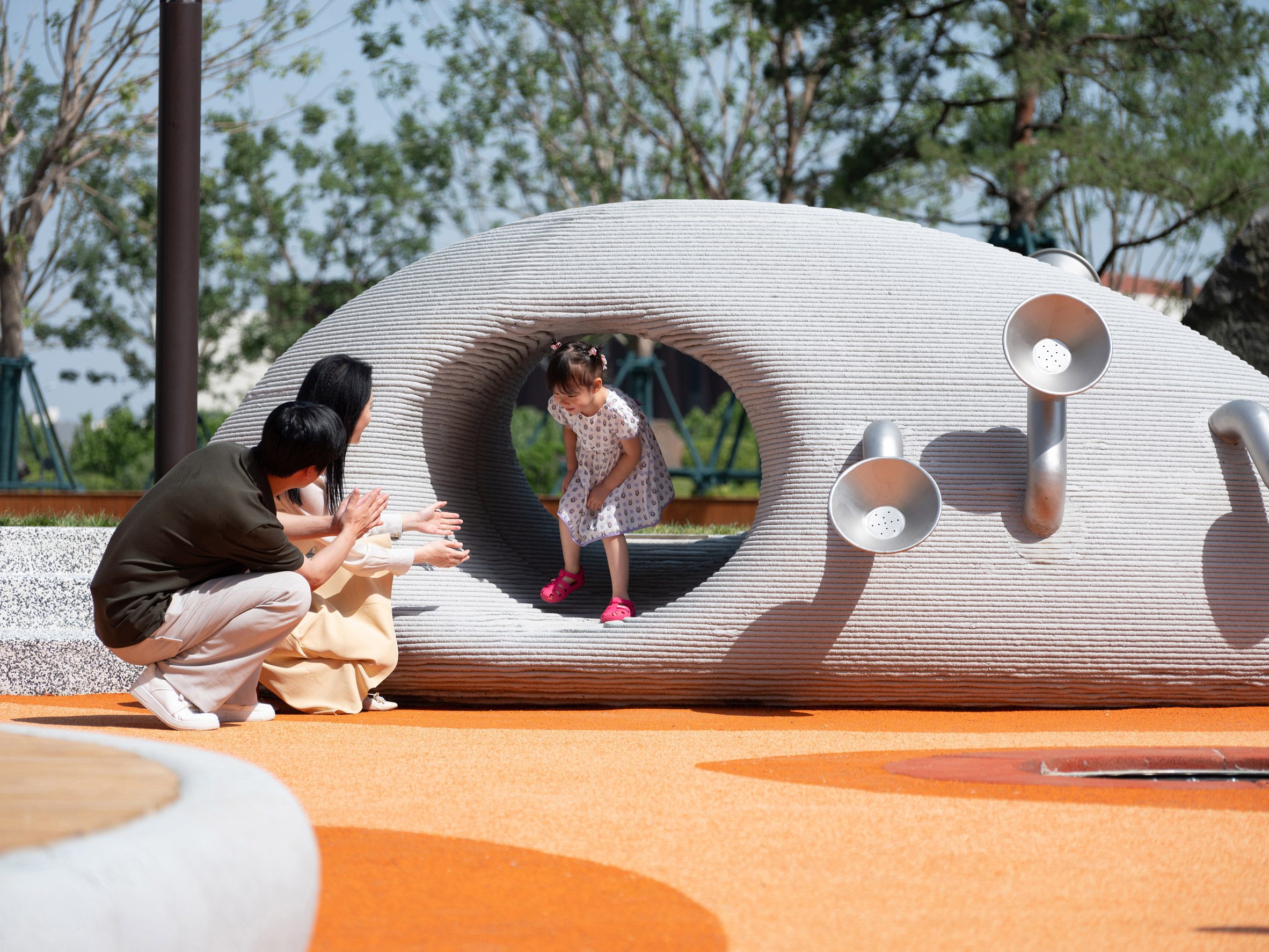 Child playing at Boulder Park by XISUI Design