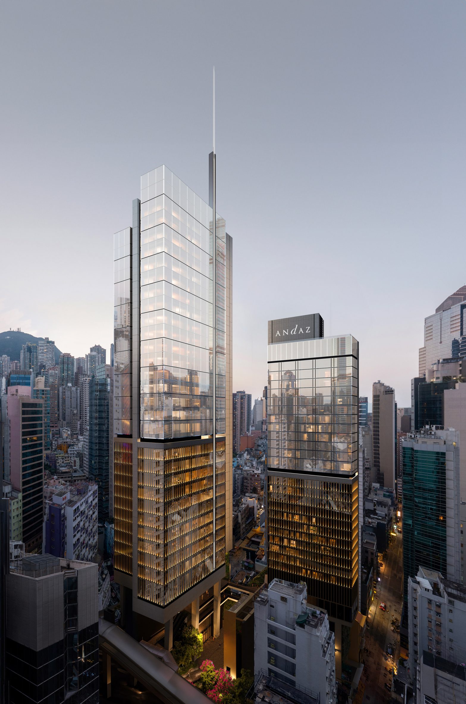 Skyscraper with glass facade and tall spire