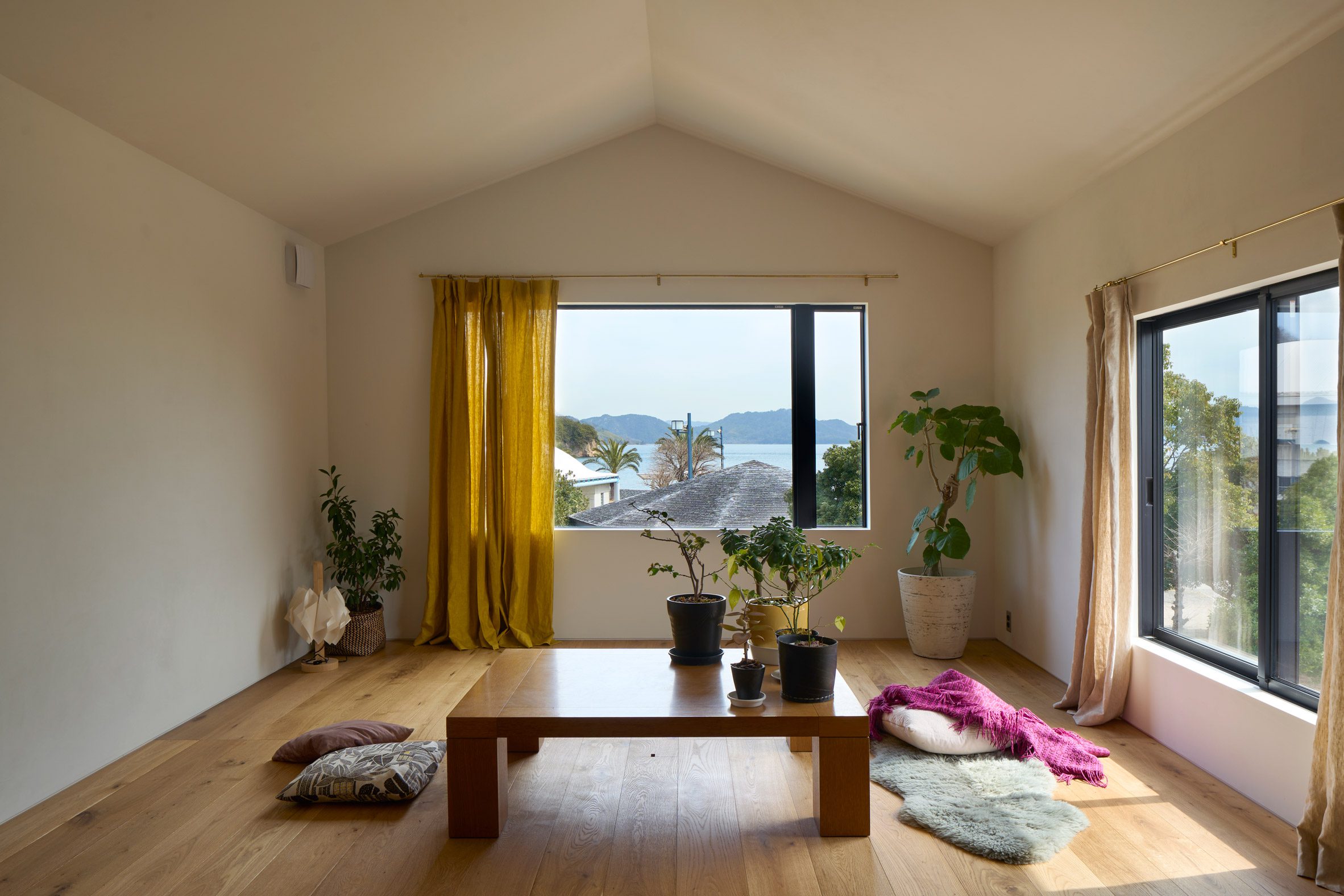Living space in Japanese house with views across the sea