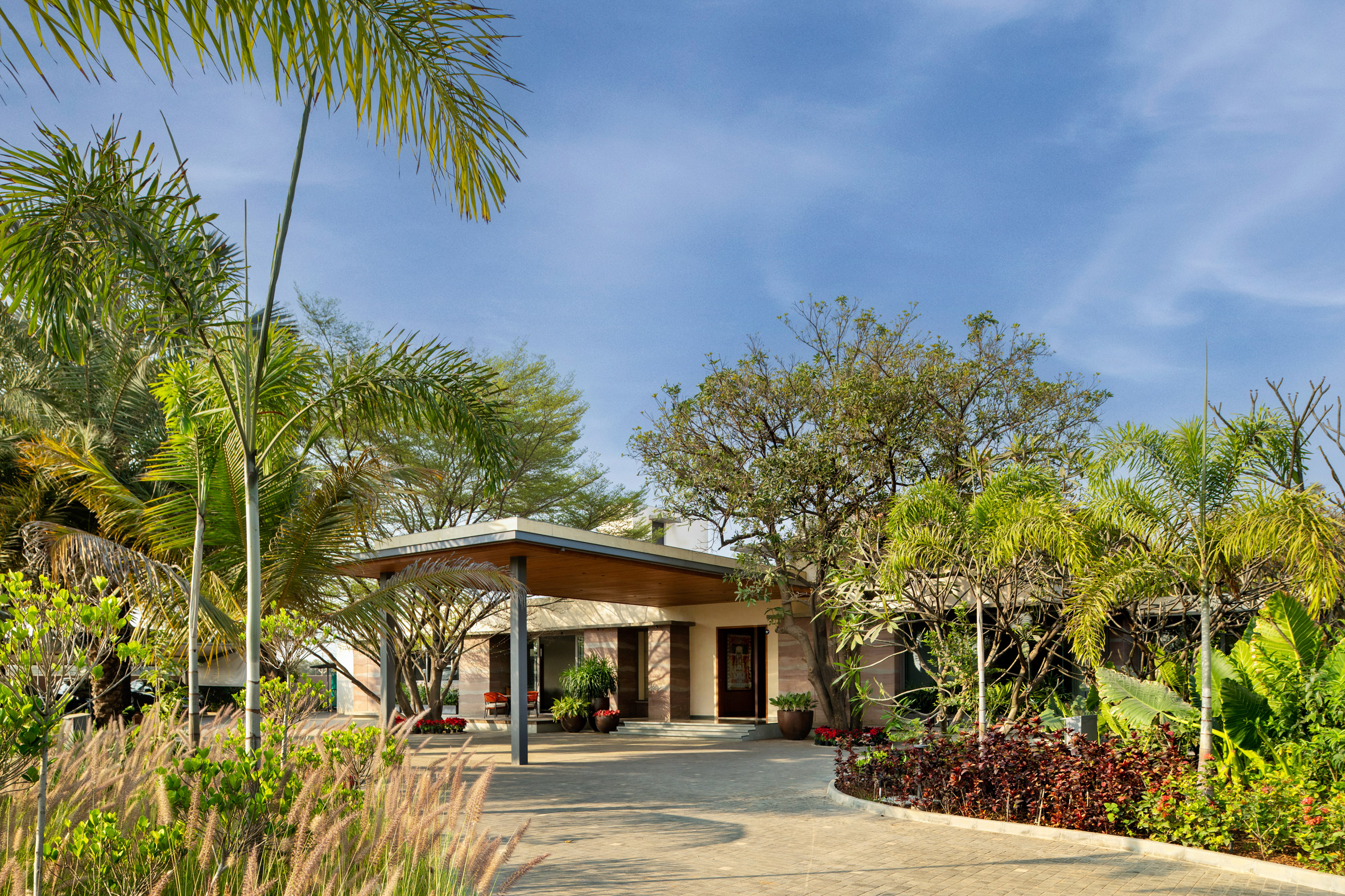 View of Indian home exterior by Hiren Patel Architects + Design