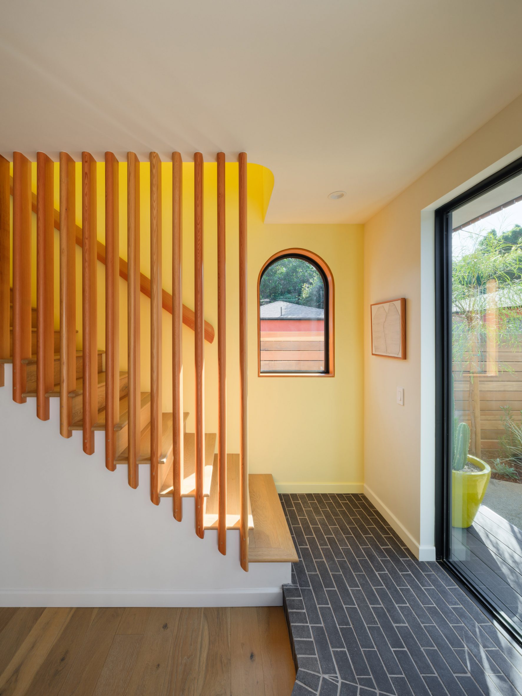 Yellow slated staircase in Los Angeles ADU