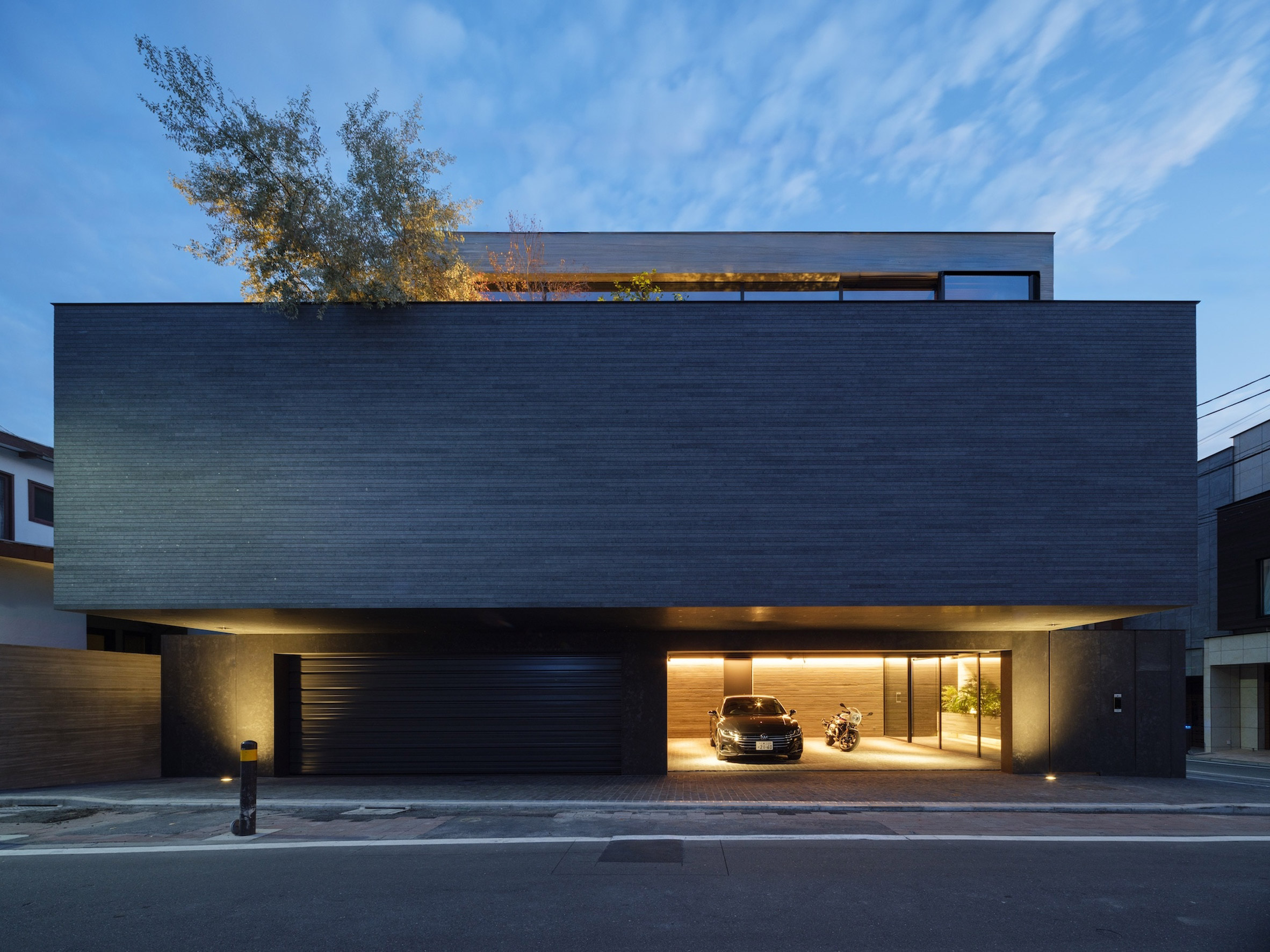 Exterior view of home by Apollo Architects & Associates