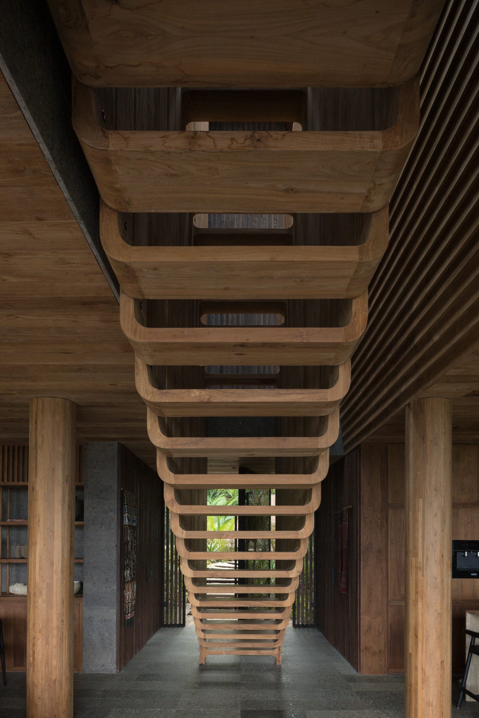 Sculptural teak staircase
