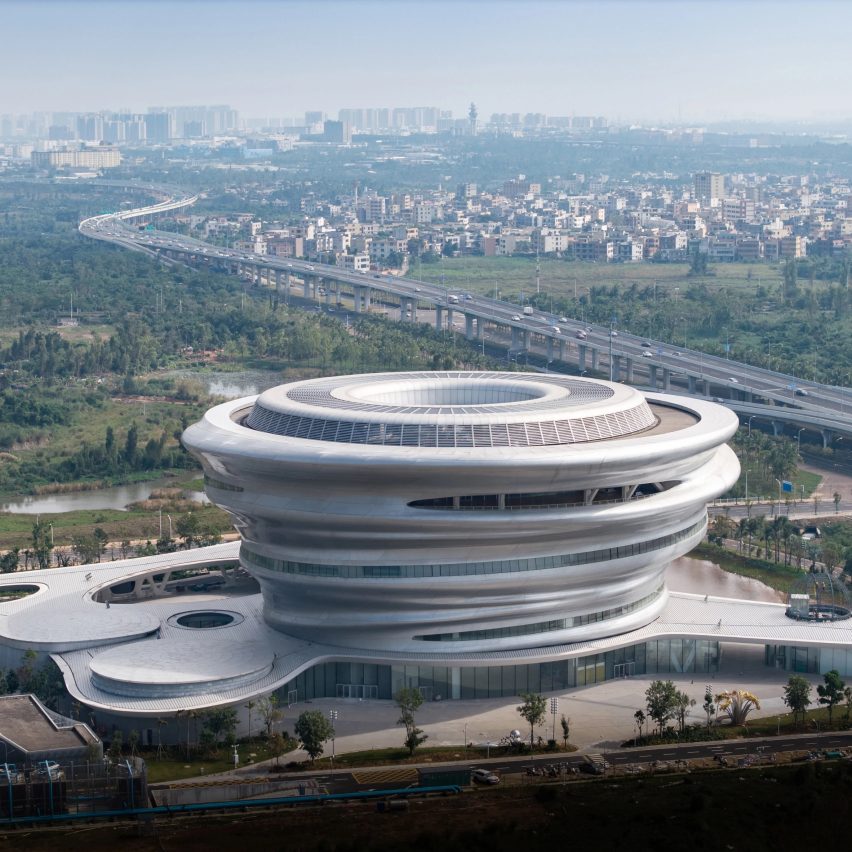 MAD clads bulbous science museum with silver-toned polymer panels in China