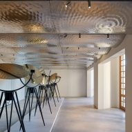 Undulating metal ceiling in art gallery